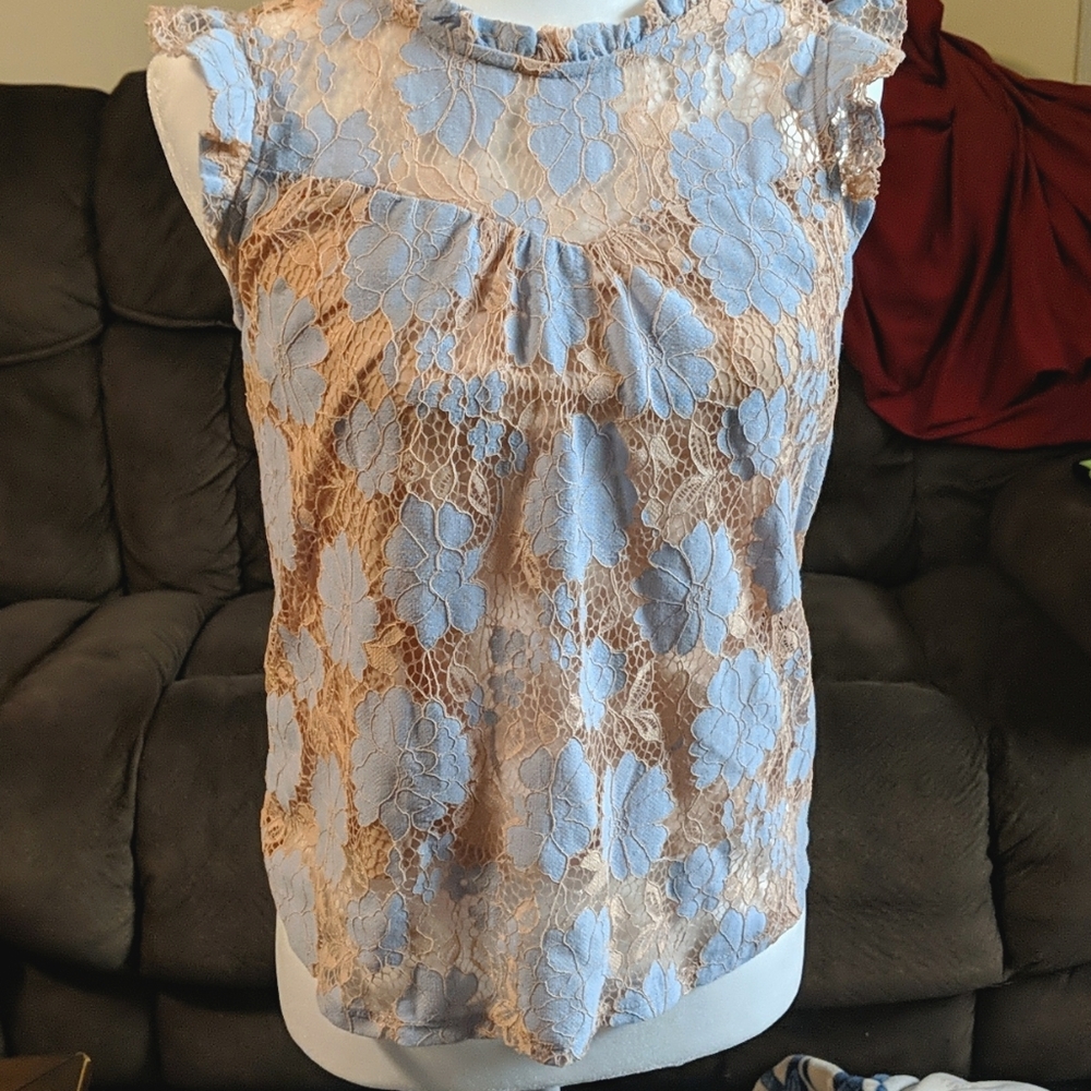 Sleeveless lace blouse
